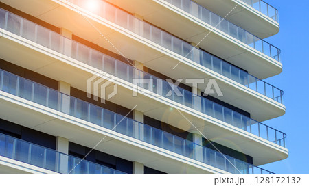 Downtown modern residential architecture. Architectural details of modern apartment building. Modern european residential apartment building complex. Downtown modern residential architecture. Architectural details of modern apartment building. Modern european residential apartment building complex. 128172132