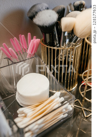 Makeup Tools and Accessories on a Vanity Table Makeup Tools and Accessories on a Vanity Table 128177633
