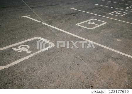 Empty Parking Spaces with Disabled Markings Visible Empty Parking Spaces with Disabled Markings Visible 128177639