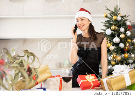 girl in New Year s atmosphere speaks on phone girl in New Year s atmosphere speaks on phone 128177855