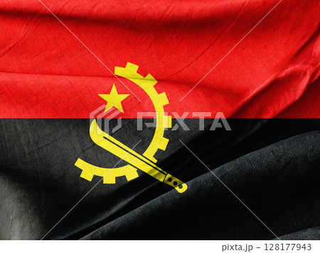 Angola National Flag Featuring Red, Black, and Yellow Symbols Raised High Angola National Flag Featuring Red, Black, and Yellow Symbols Raised High 128177943