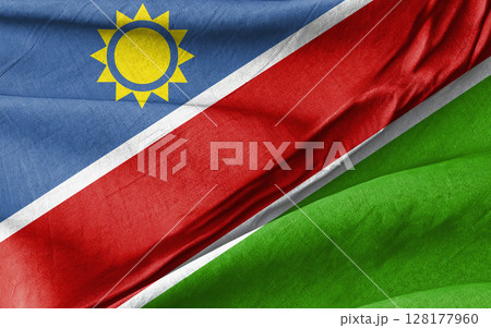 Namibia Flag Combined with Green Fabric in a Close-Up View Namibia Flag Combined with Green Fabric in a Close-Up View 128177960