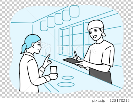 A male bar attendant taking orders at the counter A male bar attendant taking orders at the counter 128178213