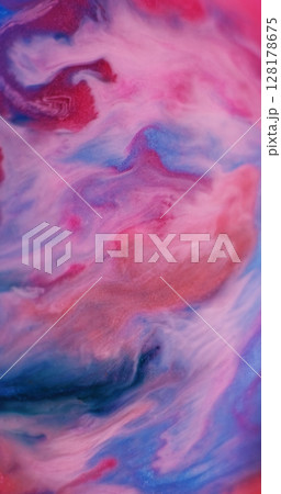 Blend drip. Flowing paint. Blur blue red orange colorful liquid marble shiny particles water fluid floating on abstract background. 128178675