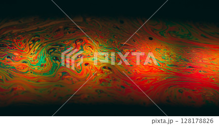 Psychedelic dye flow. Ink blur mix. Multicolor gasoline liquid vibrant wave pigment black background. Abstract red green blur glow. Psychedelic dye flow. Ink blur mix. Multicolor gasoline liquid vibrant wave pigment black background. Abstract red green blur glow. 128178826