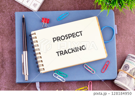 A conceptual phrase on the topic of business PROSPECT TRACKING. Economy and business concept. A conceptual phrase on the topic of business PROSPECT TRACKING. Economy and business concept. 128184950