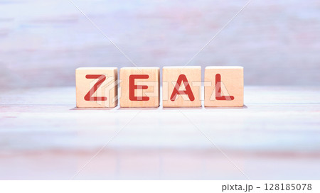 The concept word ZEAL is assembled from wooden cubes. The composition emphasizes motivation. 128185078