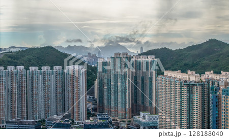 July 1 2021 Urban Skyline with High Rise Buildings and Verdant Hills in the Background 128188040