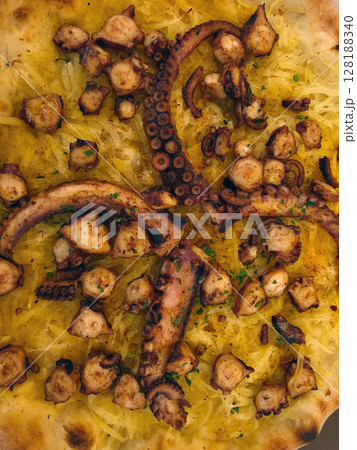 An Octopus pizza with potatoes An Octopus pizza with potatoes 128188340