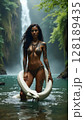 Beautiful woman with tattoos and white snake in jungle water, near a waterfall. 128189435