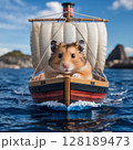 An adorable hamster navigates a small sailboat on a bright, sunny day. 128189473