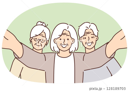 Smiling elderly people posing taking selfie together video active lifestyle and enjoying retirement 128189703