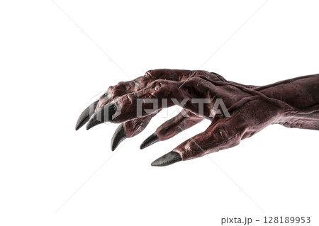 Red devil monster hand isolated on white background with clipping path Red devil monster hand isolated on white background with clipping path 128189953