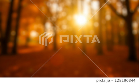 Abstract blurred autumn background with warm orange and yellow colors, bright gradient texture with soft light for design 128190844