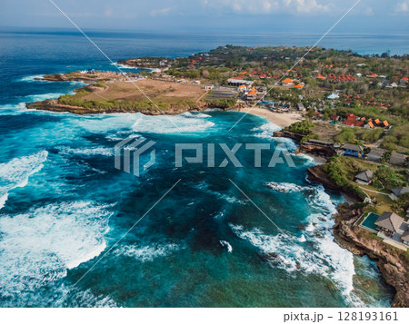 Coastline with crashing waves in ocean on Nusa Lembongan island, drone view Coastline with crashing waves in ocean on Nusa Lembongan island, drone view 128193161