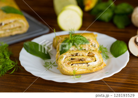 Delicious zucchini appetizer with cheese filling 128193529