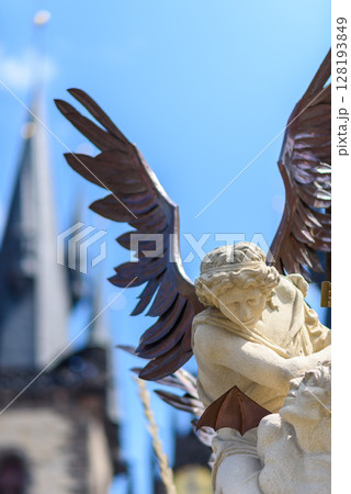 Architecture details on the Marian column, religious statue of the Virgin Mary in Old Town Square of Prague, Czech Republic 128193849