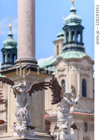 Architecture details on the Marian column, religious statue of the Virgin Mary in Old Town Square of Prague, Czech Republic Architecture details on the Marian column, religious statue of the Virgin Mary in Old Town Square of Prague, Czech Republic 128193851