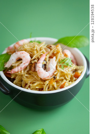 Homemade ceramic dish with vegetable rice and shrimps 128194538