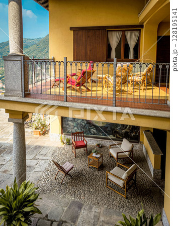 Elegant Italian Courtyard With Traditional Architecture: Cozy Outdoor Lounge And Balcony In A Lombardy Villa Elegant Italian Courtyard With Traditional Architecture: Cozy Outdoor Lounge And Balcony In A Lombardy Villa 128195141