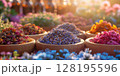 Assortment Of Colorful Spices And Dried Herbs In Wooden Bowls On Dark Stone Background: Aromatic Culinary Ingredients With Basil Leaves Cinnamon Sticks And Peppercorns Arranged For Cooking And Kitchen 128195596