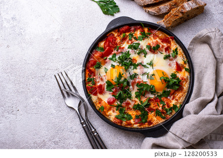 Shakshuka, traditional Jewish breakfast dish 128200533