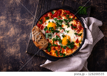 Shakshuka, traditional Jewish breakfast dish 128200535