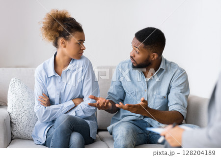 Afro Husband Talking To His Wife Trying To Reconcile On Marital Therapy Session. Selective Focus 128204189