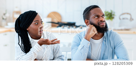Annoyed Black Man Listening Complaints From Wife In Kitchen At Home, Millennial African American Woman Blaming Husbang For Problems In Marriage, Suffering Relationship Crisis, Copy Space Annoyed Black Man Listening Complaints From Wife In Kitchen At Home, Millennial African American Woman Blaming Husbang For Problems In Marriage, Suffering Relationship Crisis, Copy Space 128205309