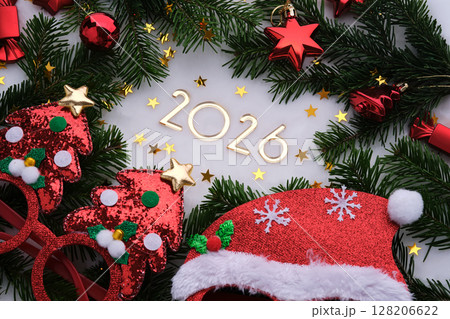 Abstract background of Christmas attributes with the year number 2026. Abstract background of Christmas attributes with the year number 2026. 128206622