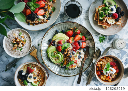 Healthy Breakfast Spread with Fresh Fruits, Avocado, Nuts, and Oatmeal 128208919