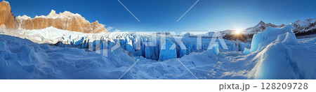 Snowy glaciers with jagged ice formations and a bright sun in the blue sky. Concept of natural beauty and adventure. For travel blogs and nature photography. Snowy glaciers with jagged ice formations and a bright sun in the blue sky. Concept of natural beauty and adventure. For travel blogs and nature photography. 128209728