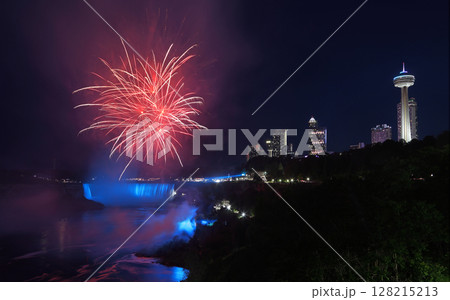 Niagara Falls skyline illuminated at dusk and fireworks, Canada 128215213