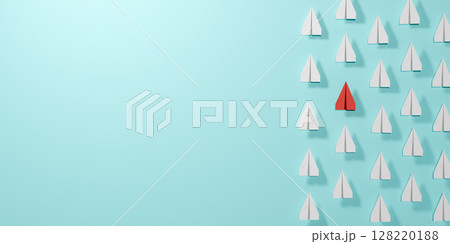 Red paper airplane stands out among white planes on light blue background, symbolizing uniqueness, individuality, being different, leadership, creativity, personal branding, and standing apart. 128220188