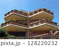 Modern apartment building with spacious balconies. Urban architecture concept 128220232