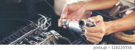 Banner Man hands fixing Car machinery vehicle mechanical service. Mechanic man hands repairing car shop. panoramaopen vehicle hood checking up auto mobile. Car maintenance engineer with copy sapce. Banner Man hands fixing Car machinery vehicle mechanical service. Mechanic man hands repairing car shop. panoramaopen vehicle hood checking up auto mobile. Car maintenance engineer with copy sapce. 128220358