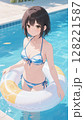 プールで浮き輪に乗って遊ぶ水着の少女 128221587