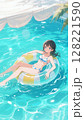 プールで浮き輪に乗って遊ぶ水着の少女 128221590