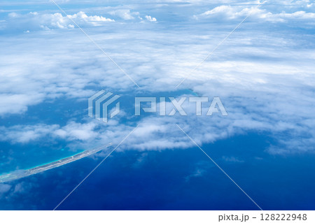 Aerial view of the Tuamotus atoll in French Polynesia with clouds 128222948