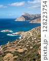 Dramatic coastline meeting deep blue sea in remote island paradise, Karpathos island, Greece 128223754