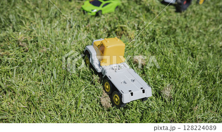 toy cars on the lawn in the sunny day toy cars on the lawn in the sunny day 128224089