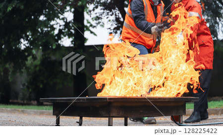 corporate safety - exercise during a firefighting course corporate safety - exercise during a firefighting course 128225422