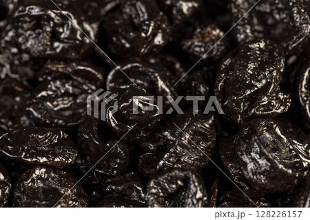 a large amount of prunes used in cooking, black prunes from small plums are dehydrated and pitted a large amount of prunes used in cooking, black prunes from small plums are dehydrated and pitted 128226157