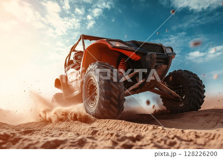 Buggy driver racing in the desert and leaving a trail of dust 128226200