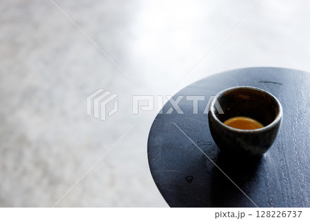 Cup of milk latte coffee on table by the street. 128226737