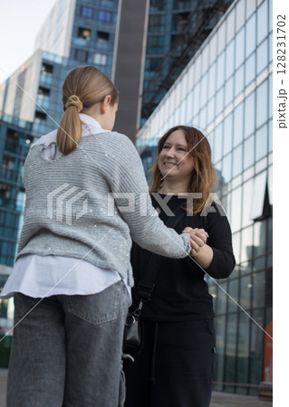 Mother and daughter having fun together. Happy female family 128231702