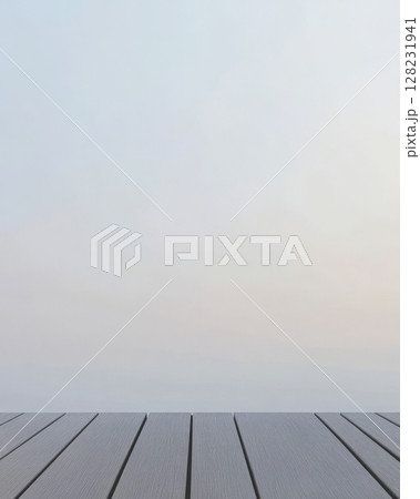 Minimalistic wooden deck overlooking serene twilight sky with soft pastel colors 128231941