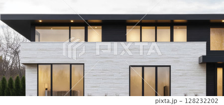 Modern minimalist house exterior with large windows and contemporary design Modern minimalist house exterior with large windows and contemporary design 128232202