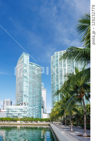 Modern skyline of Miami with towering skyscrapers, tropical vibe, and waterfront views Modern skyline of Miami with towering skyscrapers, tropical vibe, and waterfront views 128232778
