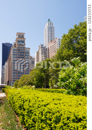 Vibrant sunny view of Chicago downtown skyline under a blue sky 128233553